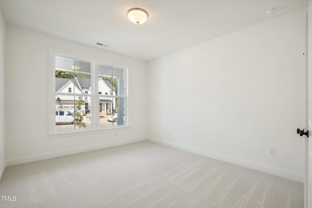 unfurnished room with carpet