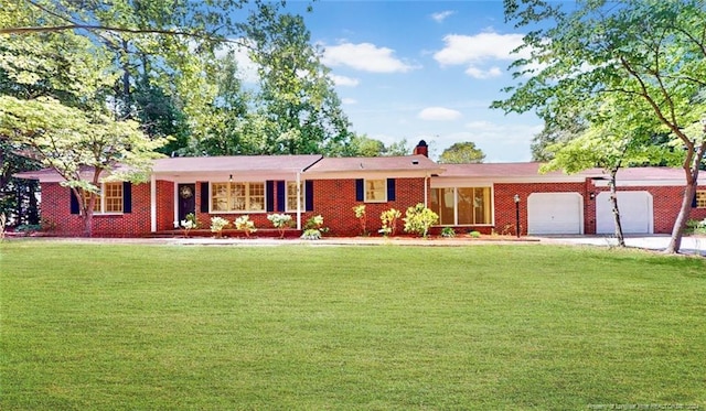 ranch-style house with a garage and a front yard