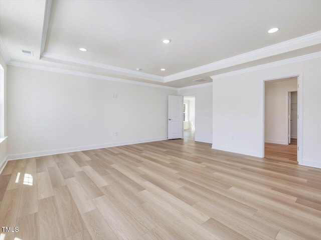 empty room featuring crown molding, recessed lighting, visible vents, light wood-style floors, and baseboards