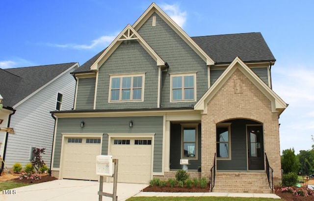 craftsman inspired home featuring a garage