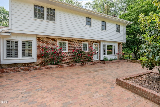 view of front facade featuring a patio area