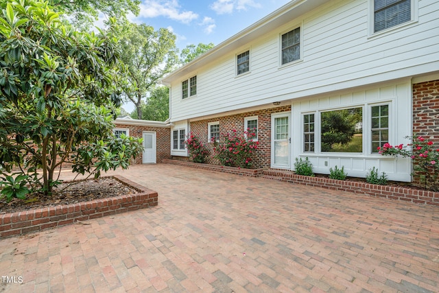 back of house featuring a patio area