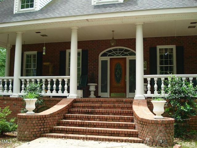 property entrance with a porch