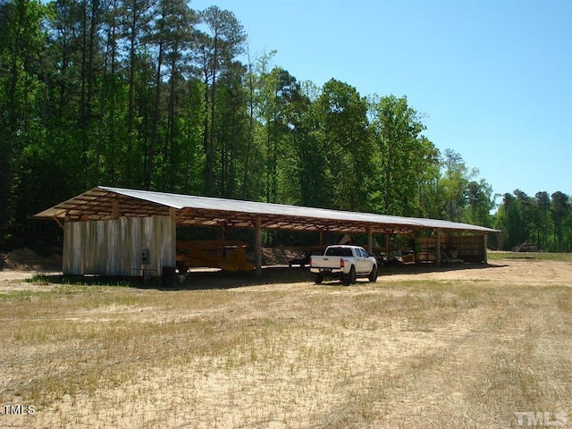 view of shed / structure with a carport