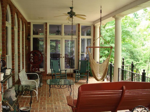 exterior space with ceiling fan