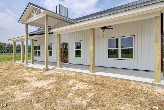 rear view of house featuring a patio area and ceiling fan