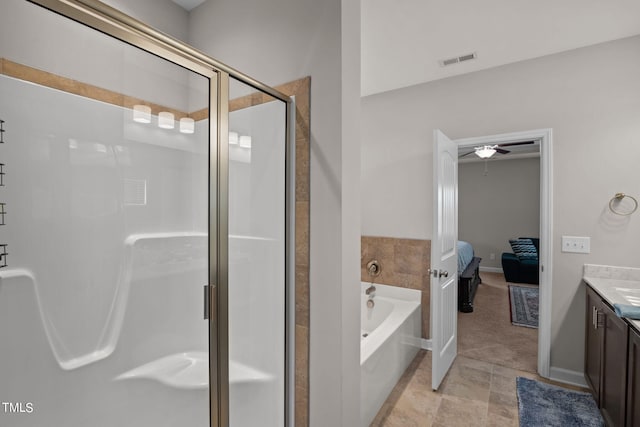 bathroom with tile floors, vanity, independent shower and bath, and ceiling fan