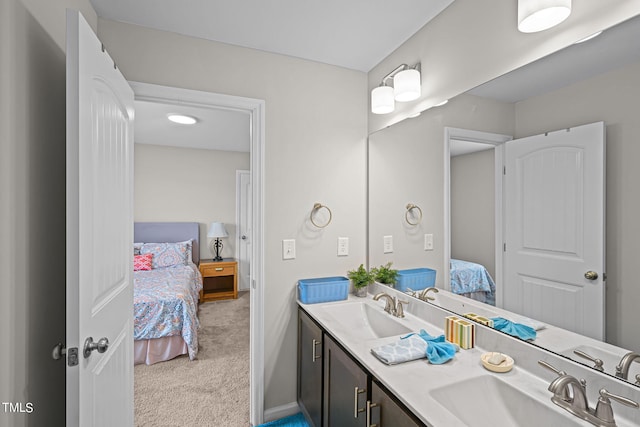 bathroom featuring dual bowl vanity