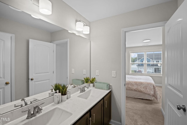 bathroom featuring dual bowl vanity