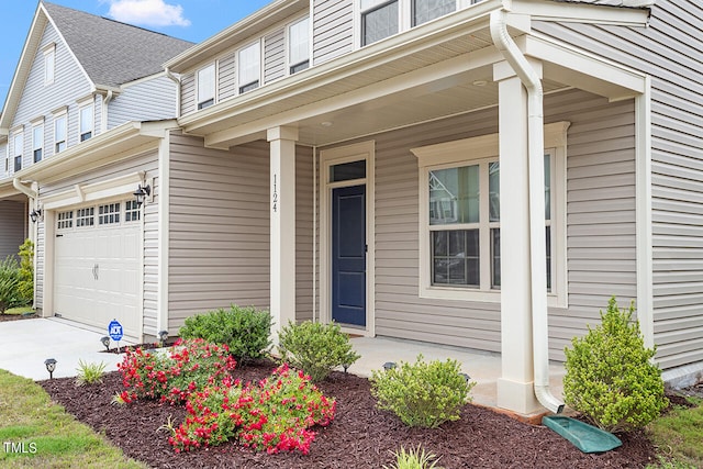 doorway to property with a porch