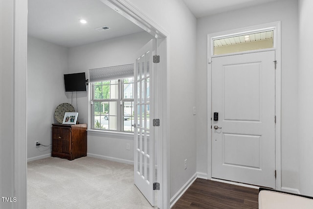 entrance foyer featuring hardwood / wood-style floors