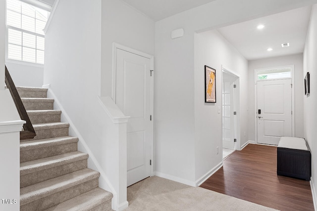 foyer entrance with wood-type flooring