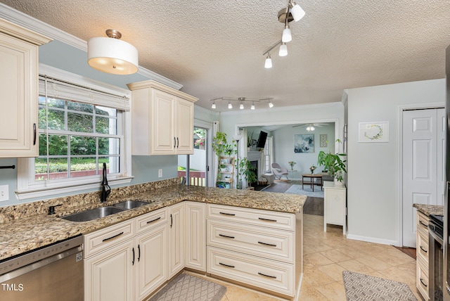 kitchen with dishwasher, crown molding, track lighting, sink, and light tile floors