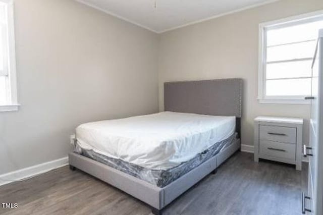 bedroom featuring hardwood / wood-style floors