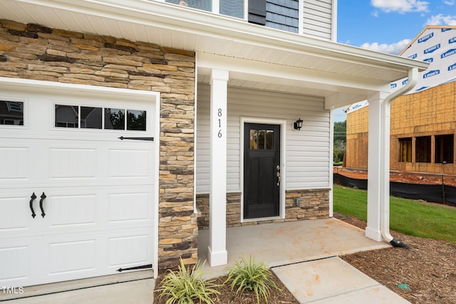 entrance to property with covered porch