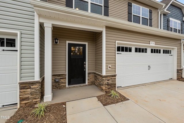 property entrance featuring a garage