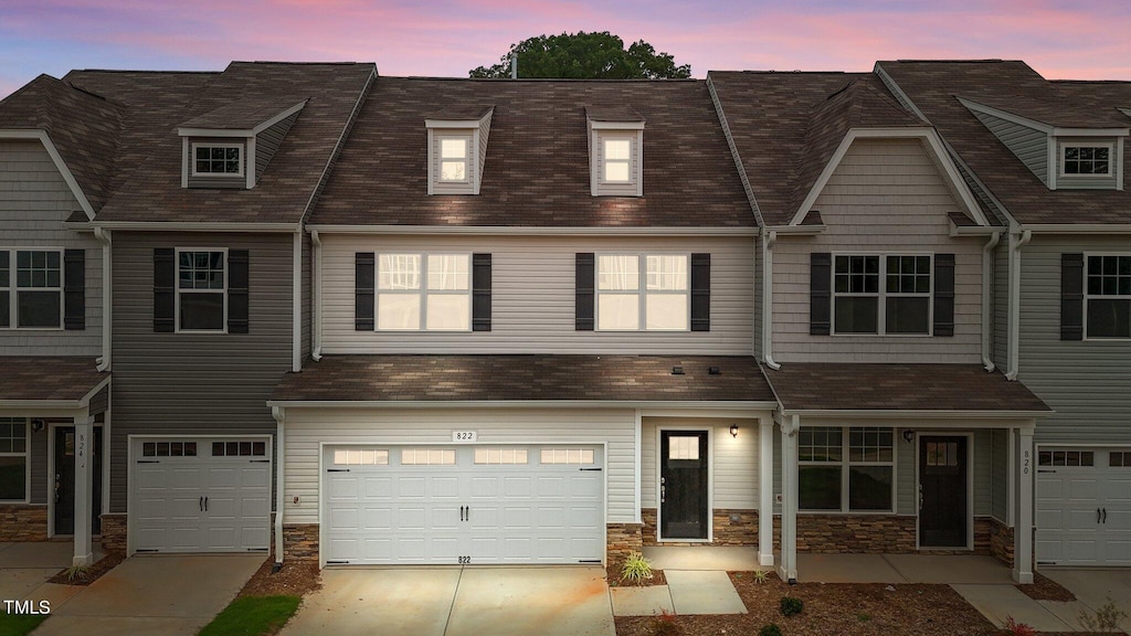 view of property featuring a garage