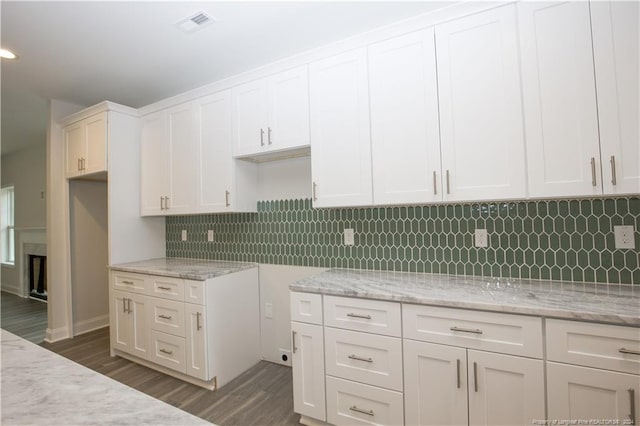 816 Red Hawk Pl, Vass, NC 28394 - kitchen featuring dark wood-style floors, light stone counters, white cabinets, and recessed lighting