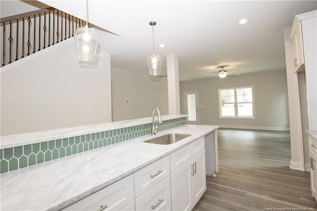 816 Red Hawk Pl, Vass, NC 28394 - kitchen with ceiling fan, white cabinetry, hanging light fixtures, light wood-style flooring, and recessed lighting