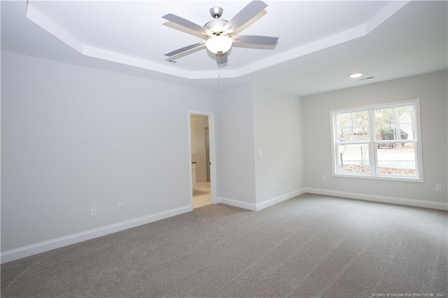 816 Red Hawk Pl, Vass, NC 28394 - unfurnished room with a raised ceiling, ceiling fan, carpet flooring, and recessed lighting