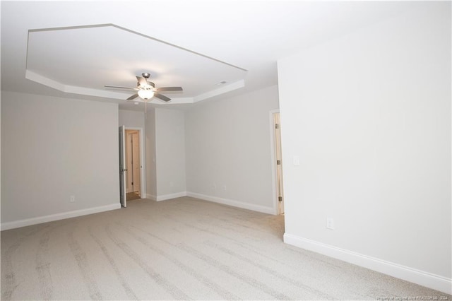 816 Red Hawk Pl, Vass, NC 28394 - carpeted empty room featuring a raised ceiling and ceiling fan