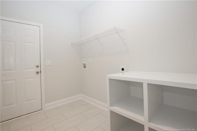 816 Red Hawk Pl, Vass, NC 28394 - laundry room featuring hookup for a washing machine, electric dryer hookup, and wood tiled floors
