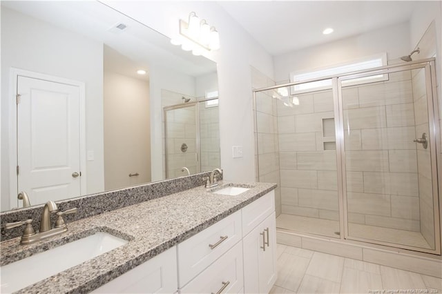 816 Red Hawk Pl, Vass, NC 28394 - full bathroom featuring a shower stall, double vanity, and recessed lighting