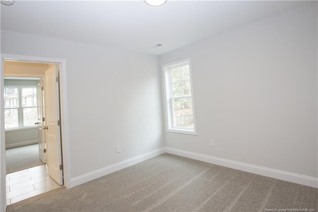816 Red Hawk Pl, Vass, NC 28394 - carpeted empty room featuring baseboards