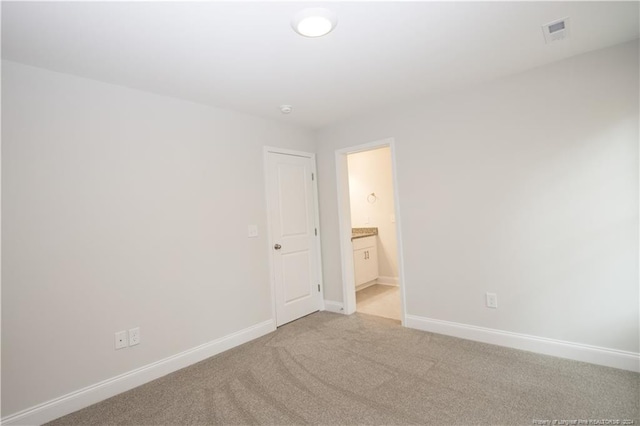 816 Red Hawk Pl, Vass, NC 28394 - unfurnished room with baseboards and light carpet
