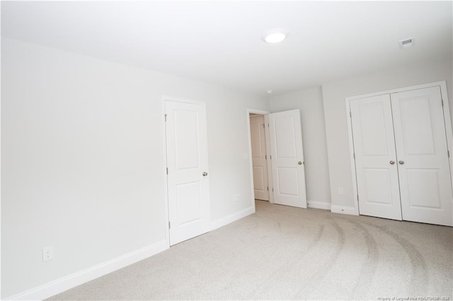 816 Red Hawk Pl, Vass, NC 28394 - unfurnished bedroom with carpet and a closet