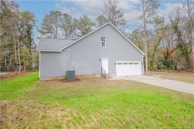 816 Red Hawk Pl, Vass, NC 28394 - view of side of home featuring concrete driveway, a yard, roof with shingles, and a garage