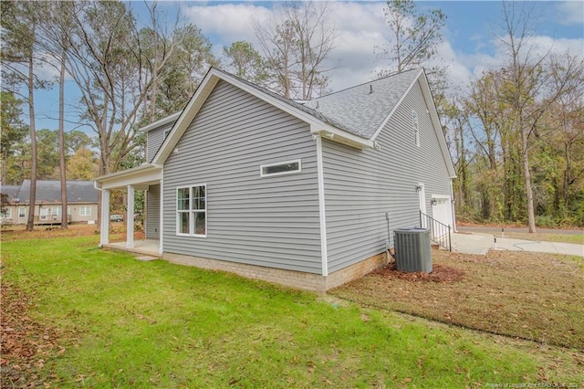 816 Red Hawk Pl, Vass, NC 28394 - view of home's exterior with driveway, a garage, and a lawn