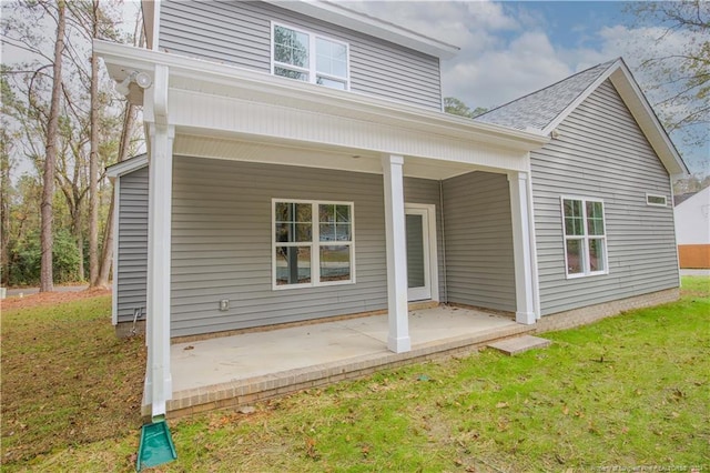 816 Red Hawk Pl, Vass, NC 28394 - back of property featuring a yard