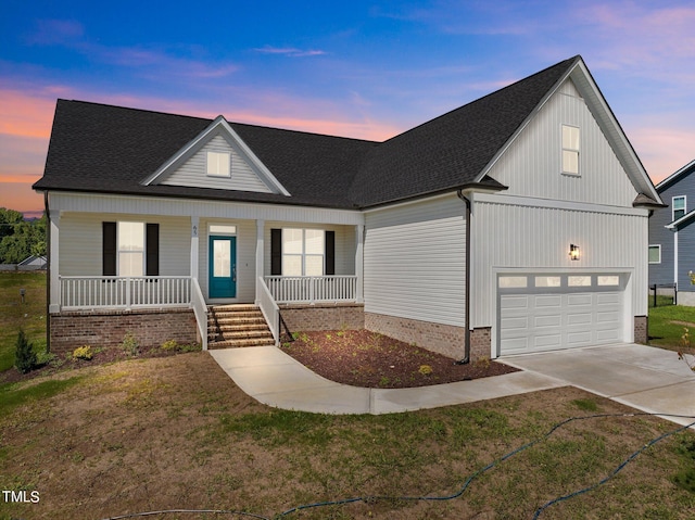 view of front of property featuring covered porch and a lawn