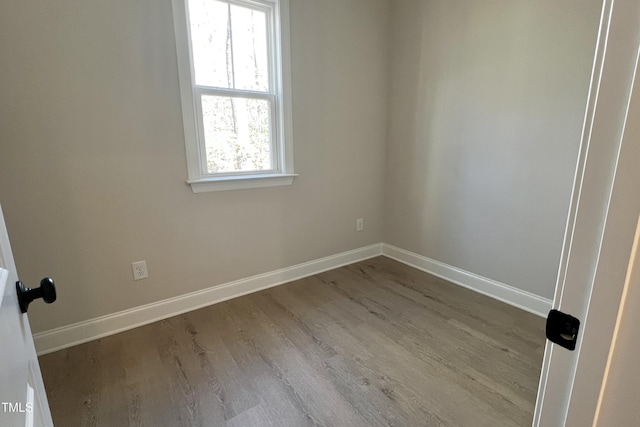 unfurnished room featuring light wood-type flooring