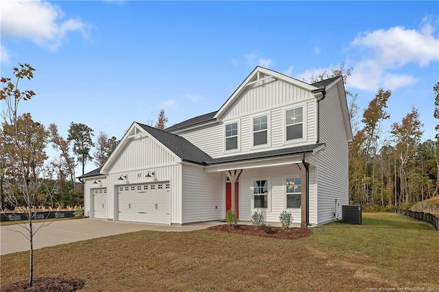 craftsman-style home with a garage, a front yard, and central AC