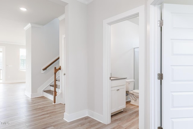 592 Barbour Farm Ln, Four Oaks, NC 27524 - corridor with ornamental molding, light wood-style floors, stairs, and recessed lighting