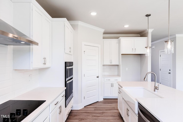 592 Barbour Farm Ln, Four Oaks, NC 27524 - kitchen with black electric stovetop, ornamental molding, wall chimney exhaust hood, white cabinetry, and stainless steel dishwasher