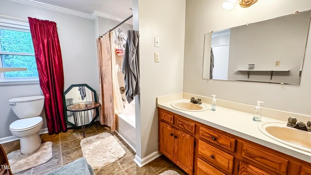 full bath with crown molding, double vanity, toilet, baseboards, and tile patterned flooring