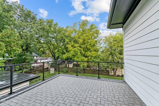 view of patio / terrace with a balcony