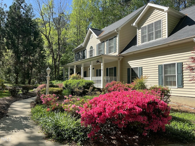 7811 Still Crossing Rd, Chapel Hill, NC 27516 - view of side of property with a porch, ceiling fan, and roof with shingles