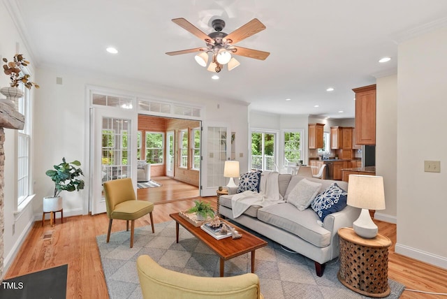 7811 Still Crossing Rd, Chapel Hill, NC 27516 - living room featuring baseboards, light wood finished floors, recessed lighting, a ceiling fan, and crown molding