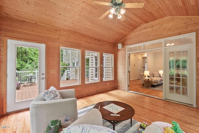 7811 Still Crossing Rd, Chapel Hill, NC 27516 - living room with wood walls, wood ceiling, ceiling fan, wood finished floors, and high vaulted ceiling