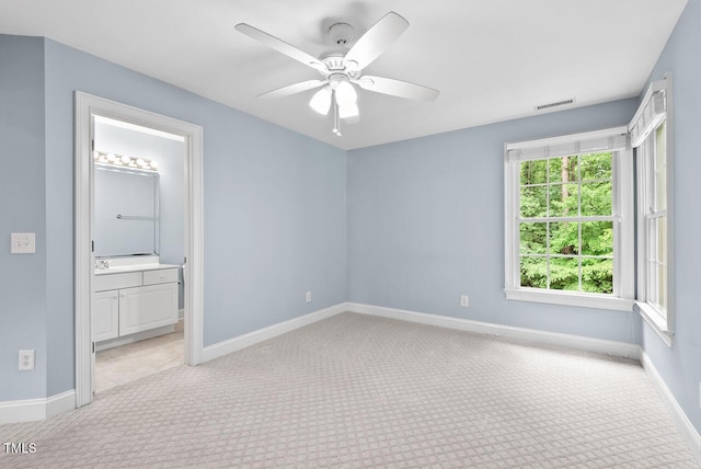 7811 Still Crossing Rd, Chapel Hill, NC 27516 - unfurnished bedroom featuring light colored carpet, baseboards, ensuite bath, and a ceiling fan