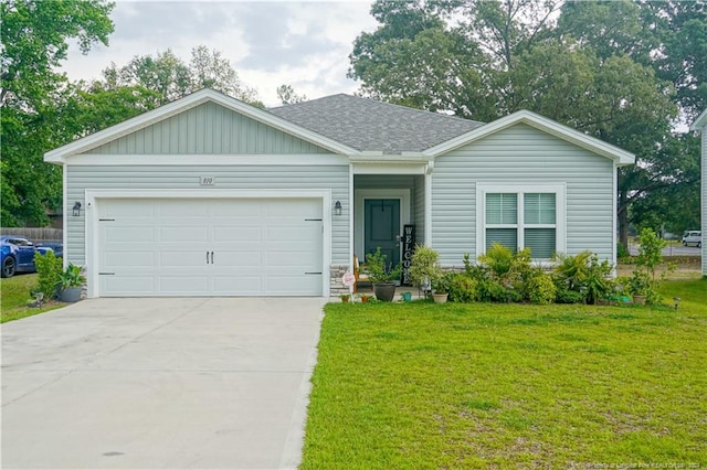 single story home with a garage and a front yard