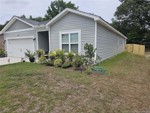 view of front facade with an attached garage and concrete driveway