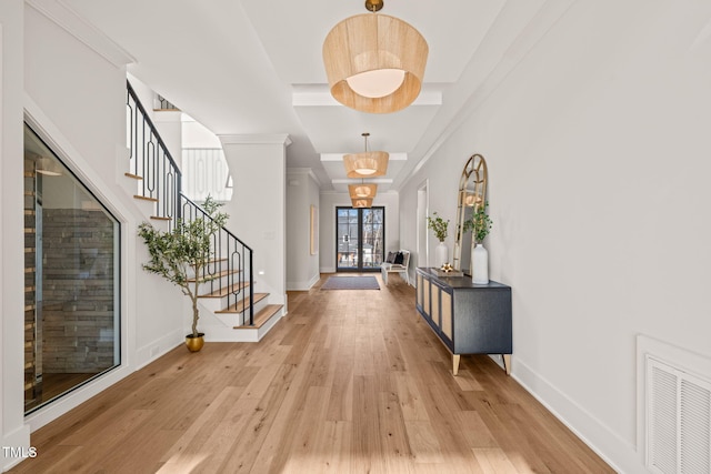 entryway featuring french doors and light hardwood / wood-style floors