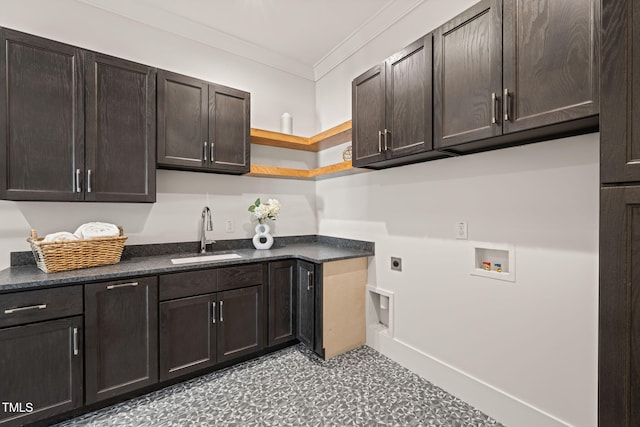 laundry area featuring sink, cabinets, ornamental molding, hookup for a washing machine, and hookup for an electric dryer