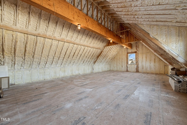 bonus room featuring vaulted ceiling