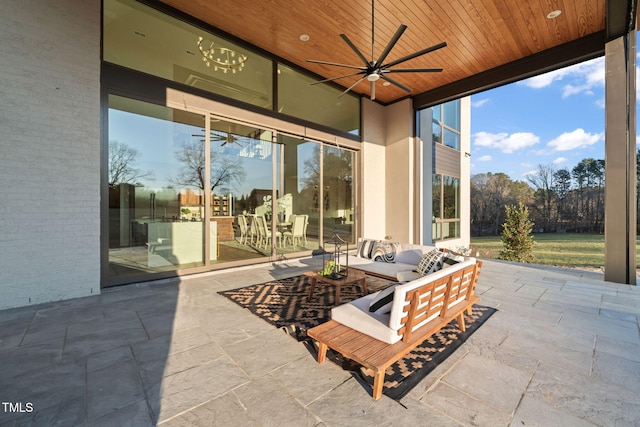 view of patio / terrace with an outdoor living space and ceiling fan